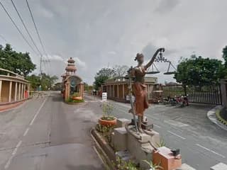 Statue of Lady Justice at the Katarungan Village entrance